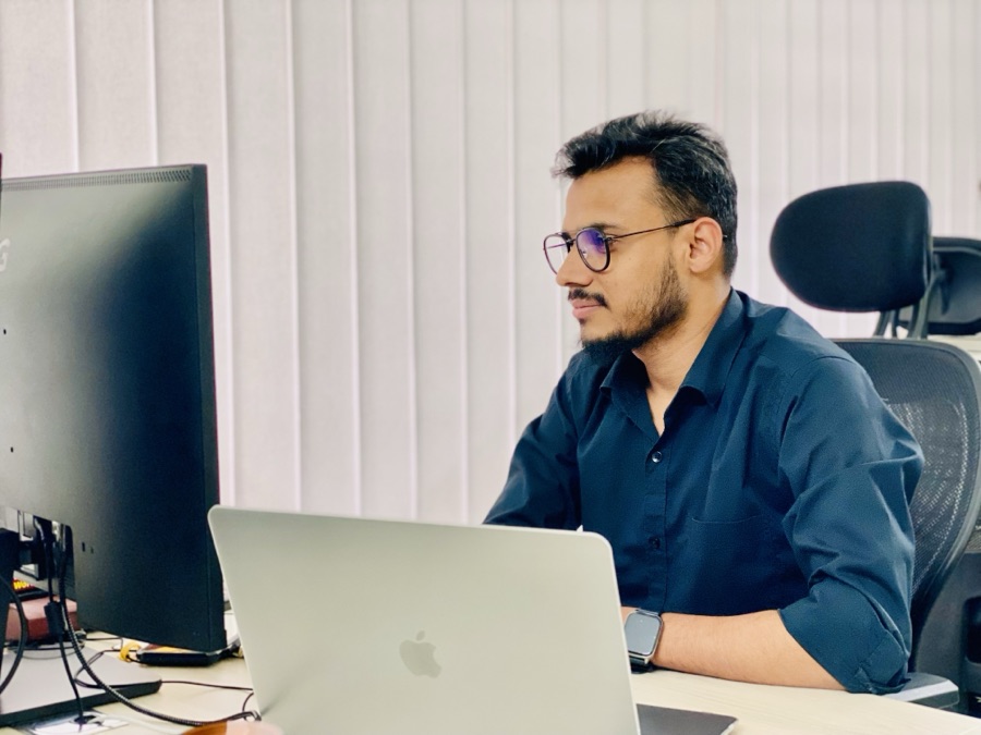 Mostofa coding at his desk