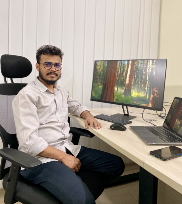 Mostofa at his desk